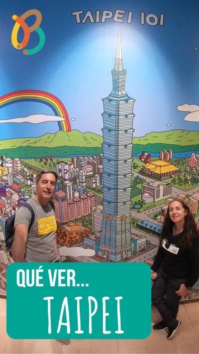 HECTOR, Navarro, de mi baúl de blogs, junto a un cartel de Taipei en el que sale el rascacielos